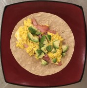 #whatsforbreakfast Tumaro’s Low Carb/High Fiber Tortilla, Muenster Cheese, Sautéed  Ham, Butter Scrambled Eggs, and Avocado
