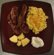 #whatsforbreakfast Butter Scrambled Eggs w/ Shredded Cheese, Bacon, Pineapple w/ Whipped Spiced Cream Cheese