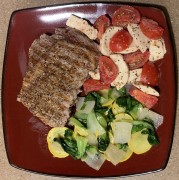 #whatsfordinner Grilled Steak, Caprese, and Onion-Butter Sauteed Bok Choy and Yellow Squash