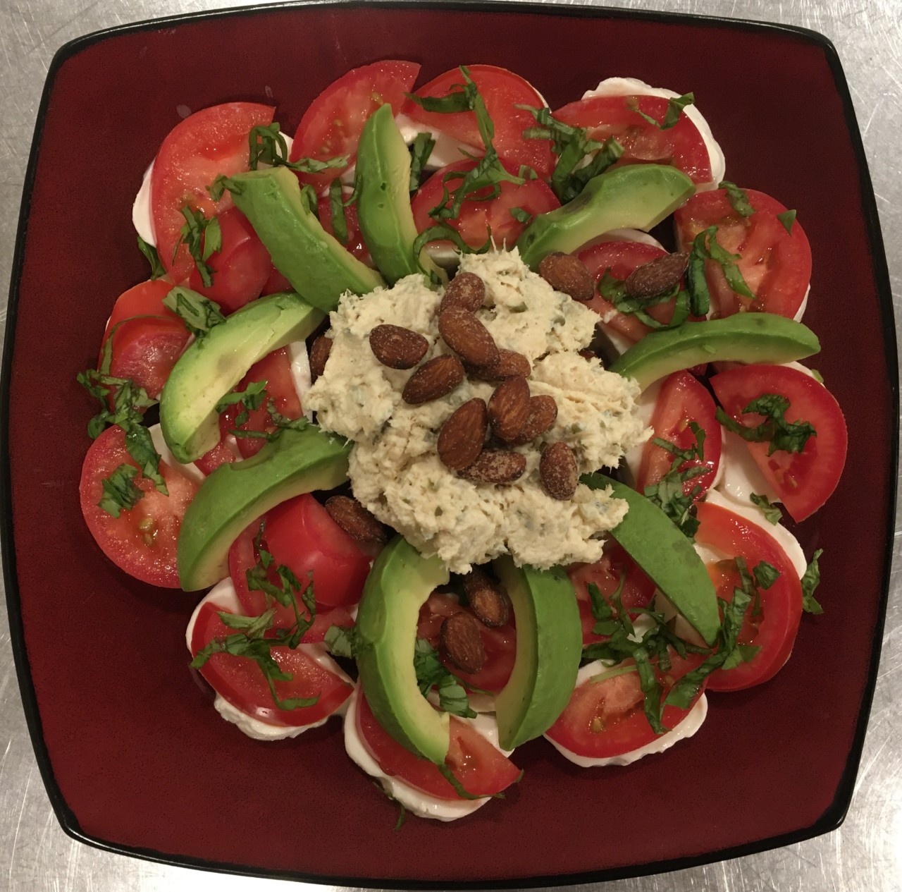 <a class="bx-tag" rel="tag" href="https://streetloc.com/view-channel-profile/whatsfordinner"><s>#</s><b>whatsfordinner</b></a> Chicken Salad, surrounded by Caprese with fresh Basil and Avocado, sprinkled with a few Smoked Almonds. <a class="bx-tag" rel="tag" href="https://streetloc.com/view-channel-profile/keto"><s>#</s><b>keto</b></a> <a class="bx-tag" rel="tag" href="https://streetloc.com/view-channel-profile/healthymito"><s>#</s><b>healthymito</b></a> <a class="bx-tag" rel="tag" href="https://streetloc.com/view-channel-profile/healthyeats"><s>#</s><b>healthyeats</b></a>