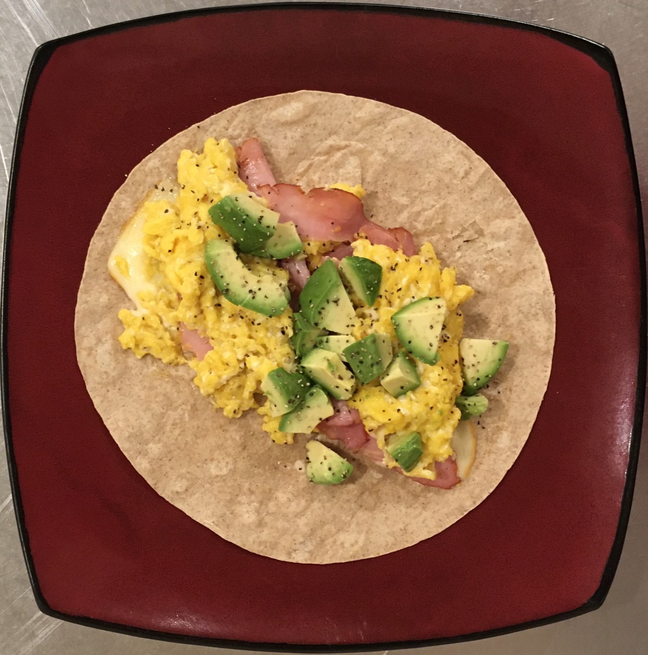<a class="bx-tag" rel="tag" href="https://streetloc.com/view-channel-profile/whatsforbreakfast"><s>#</s><b>whatsforbreakfast</b></a> Tumaro’s Low Carb/High Fiber Tortilla, Muenster Cheese, Sautéed  Ham, Butter Scrambled Eggs, and Avocado