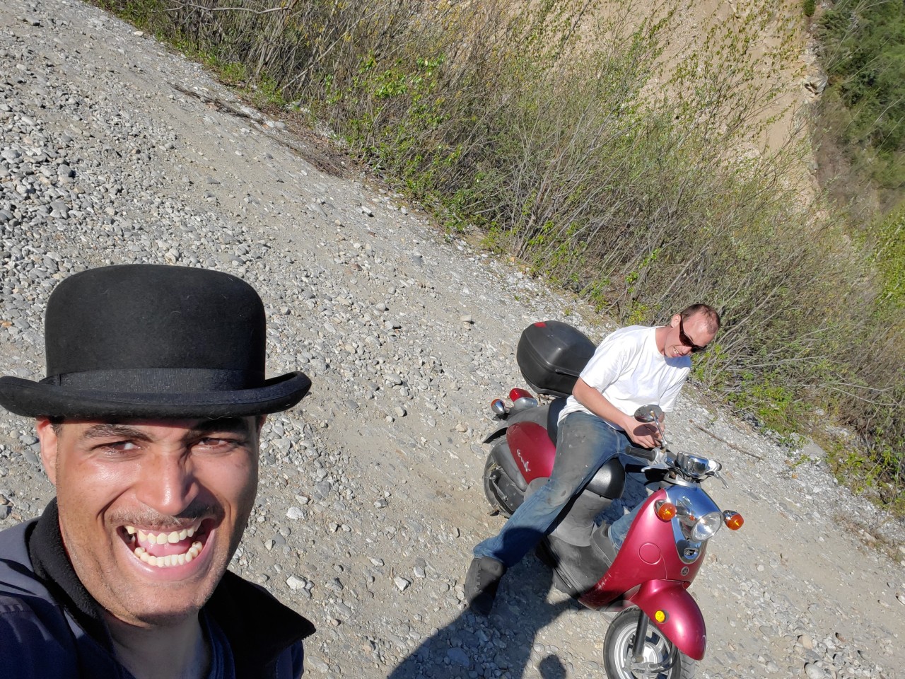 Me and my homie, Jacob Cotton, riding our scooters around.  Well... he was riding Bob's.. I was riding my Ruckus.